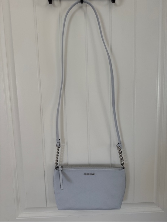 Calvin Klein Handbags - Calvin Klein Light Blue Saffiano Zip Pouch with Silver Logo